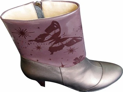 Laser engraving butterfly image on boots