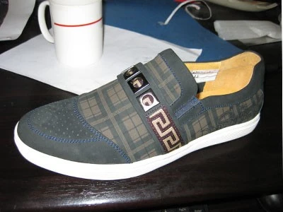 Symmetrical patterns were marking on shoes Symmetrical patterns were marking on shoes